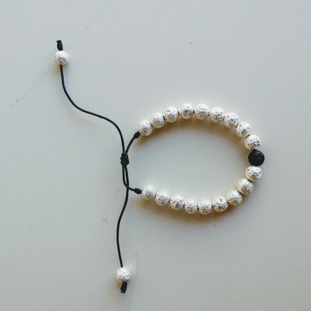 Silver lava stone bracelet adjustable